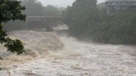 A view of the rising water levels at the Wainaku Street Bridge in Hilo on the Big Island of Hawaiʻi, Saturday, Aug. 15, 2026.