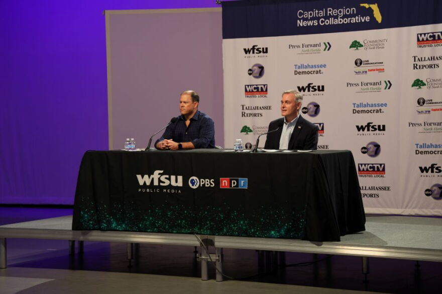 Incumbent Rick Minor and C.B. Lorch discuss issues during a candidate forum for Leon County Commission District 3 seat.