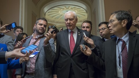 Senate Finance Committee Chairman Orrin Hatch, R-Utah, surrounded by reporters in the U.S. Capitol. The committee will hold its hearing on its tax bill next week. Senators aim  to pass it out of committee before the Thanksgiving holiday.