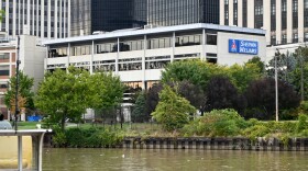 The Sherwin Williams building in Downtown Cleveland stands just behind the Cuyahoga River