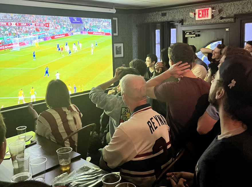  Spectators cheer on Team USA at the FIFA World Cup at Trinity Bar in New Haven.