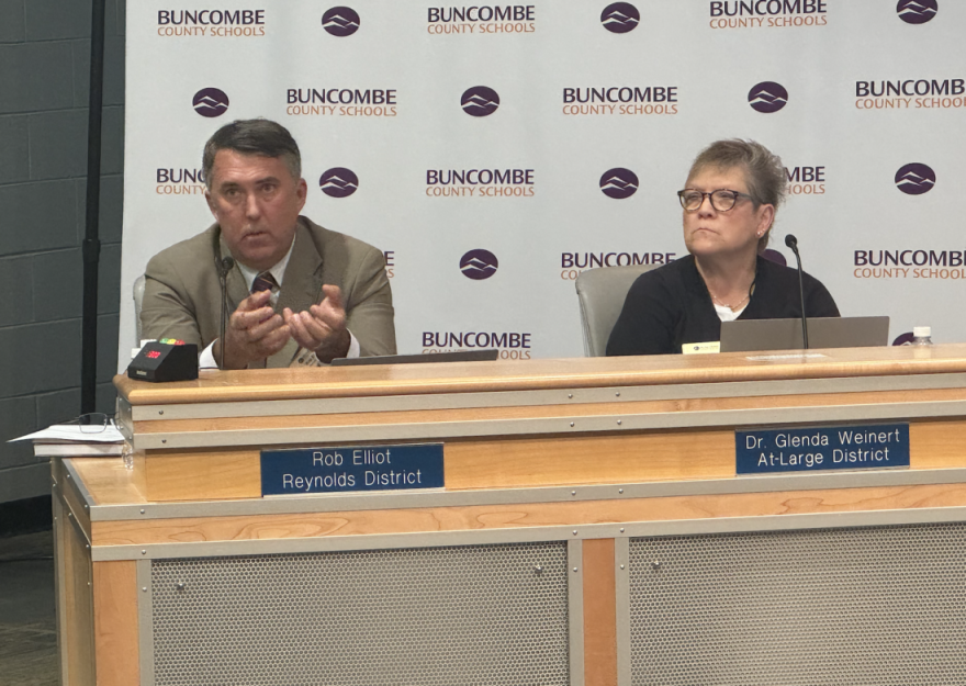 INTERIM POLICIES: Buncombe County Board of Education member Rob Elliot, left, said the shifting federal rules around Title IX regulations forced the board to pass interim sex discrimination policies. Also pictured is Board member Glenda Weinert.