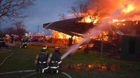Firefighters battle a three-alarm blaze at a southwest Indianapolis Denny's Sunday evening.
