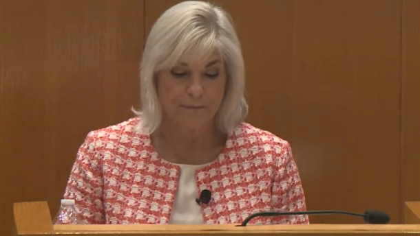 Woman at podium