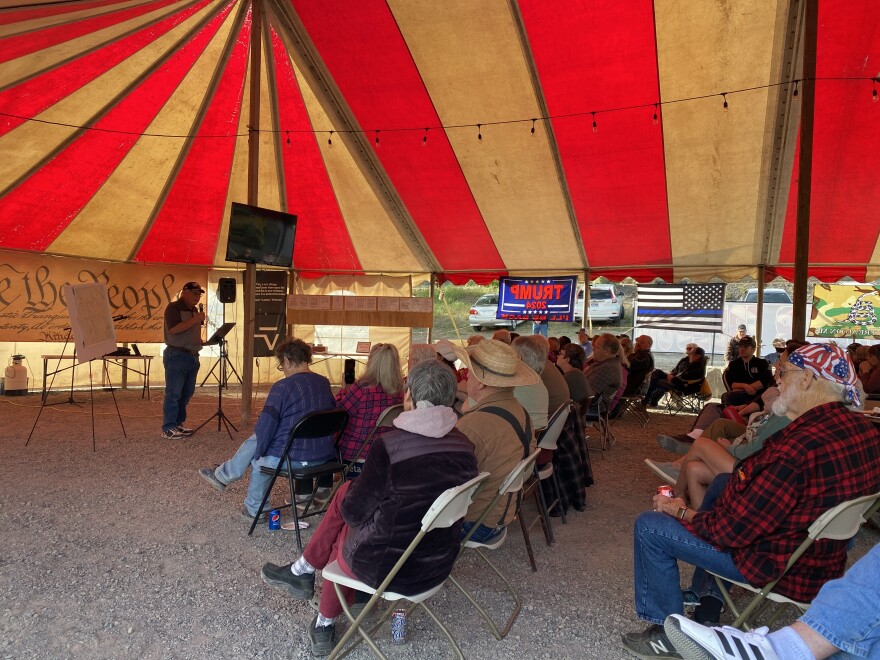 Bill Ransom, of Klamath Falls, talks to attendees of a People's Rights Oregon rally near the "A" Canal headgates on Thursday.