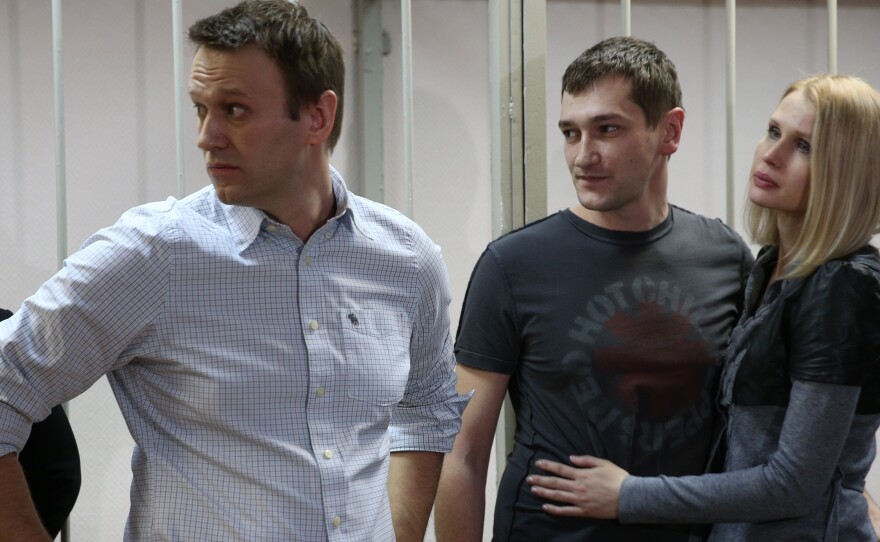 Russian opposition leader Alexey Navalny (left) and his brother Oleg Navalny appear in Moscow for sentencing last month after their conviction for fraud. Alexey was given a 3 1/2-year suspended sentence. His brother was sent to prison for the same period.