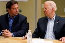 President Joe Biden, right, looks at Florida Gov. Ron DeSantis, left, during a briefing with first responders and local officials in Miami, Thursday, July 1, 2021, on the condo tower that collapsed in Surfside, Fla., last week. 