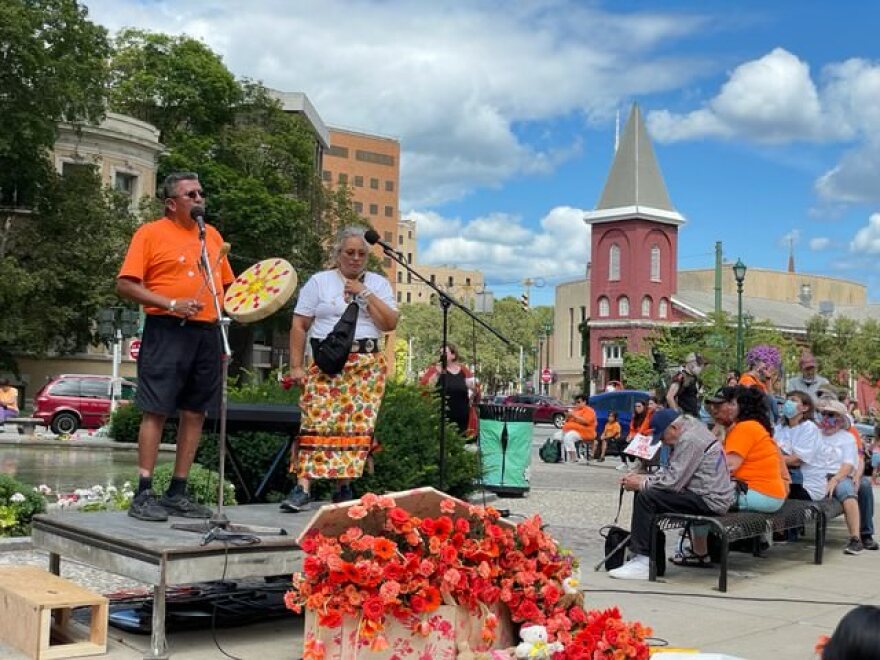 Virgil Brave Rock speaks at a rally in downtown Syracuse Saturday, July 30, 2021