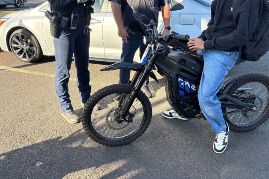 E-bikes like this one seen in Hawaii in 2025 would be treated the same as motorcycles on Utah roads under HB381.