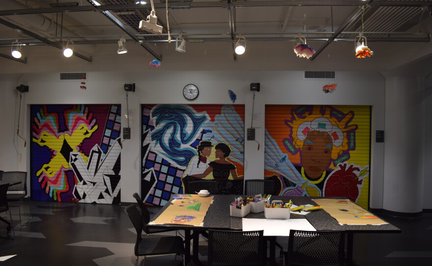 The makerspace in the basement of the library is filled with murals done by local artists.