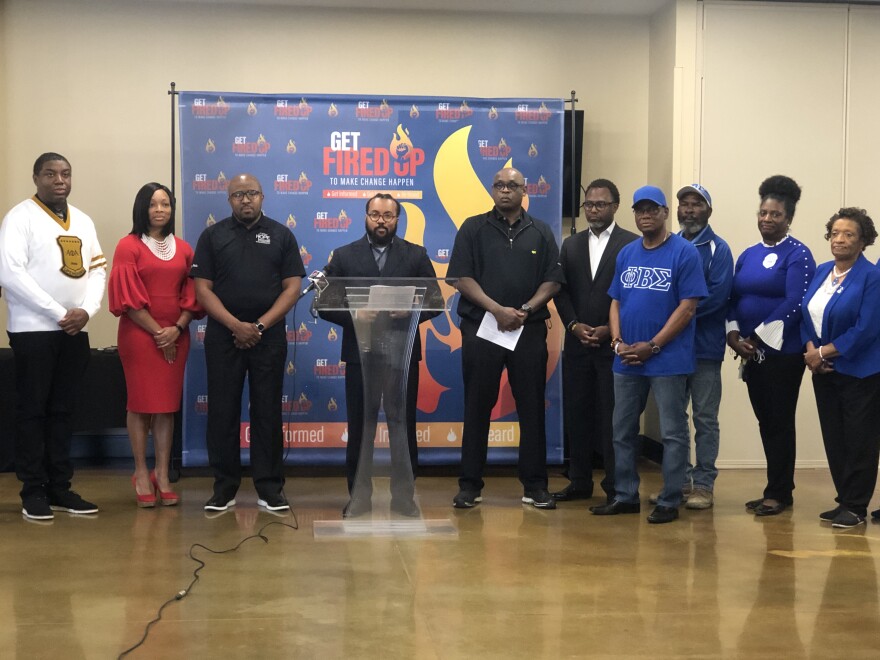 Phillip L. Pointer Sr., senior pastor of Saint Mark Baptist Church, speaks alongside faith leaders and representatives of fraternities and sororities on Monday, Oct. 24.