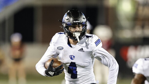 Eastern Illinois Panthers wide receiver Justin Thomas runs with the ball against Northern Illinois Huskies during the first half of an NCAA football game on Thursday, Sept. 1, 2022, in DeKalb, Ill. (AP Photo/Kamil Krzaczynski)