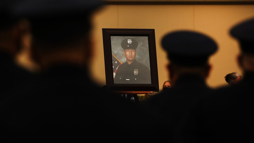 Colleagues, family and friends attend the August 2020 funeral of Los Angeles Police Department Officer Valentin Martinez, the agency's first sworn officer to die of complications from COVID-19.