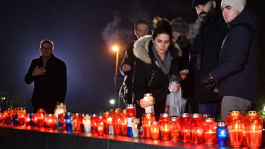 Residents of the Bosnian city of Mostar light candles Wednesday night in tribute to convicted war criminal Slobodan Praljak.