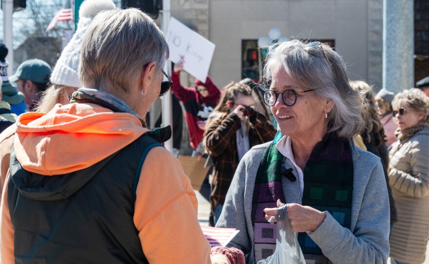 U.S. Congressional candidate Kelly Thompson meets with protesters in Albion during the No Kings 3 protest on March 28.