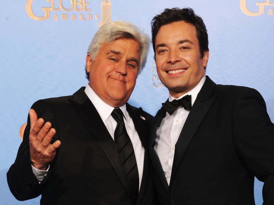 Jay Leno (left) and Jimmy Fallon at the Golden Globe Awards in January. Next year, Fallon will be taking Leno's place on <em>The Tonight Show</em>, NBC says.