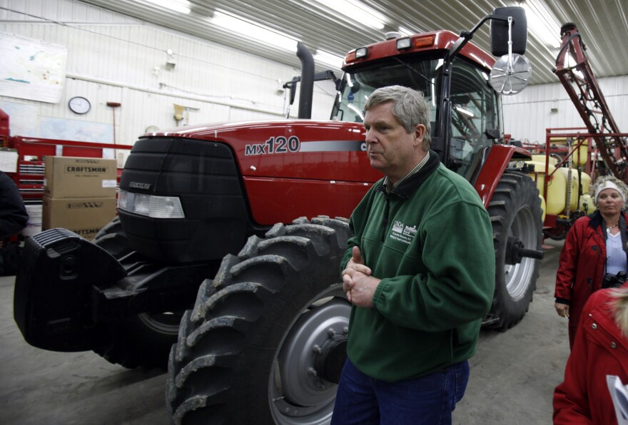 U.S. Agriculture Secretary Tom Vilsack tours the Gordon Wassenaar farm on Tuesday, April 19, 2011, in Prairie City, Iowa.