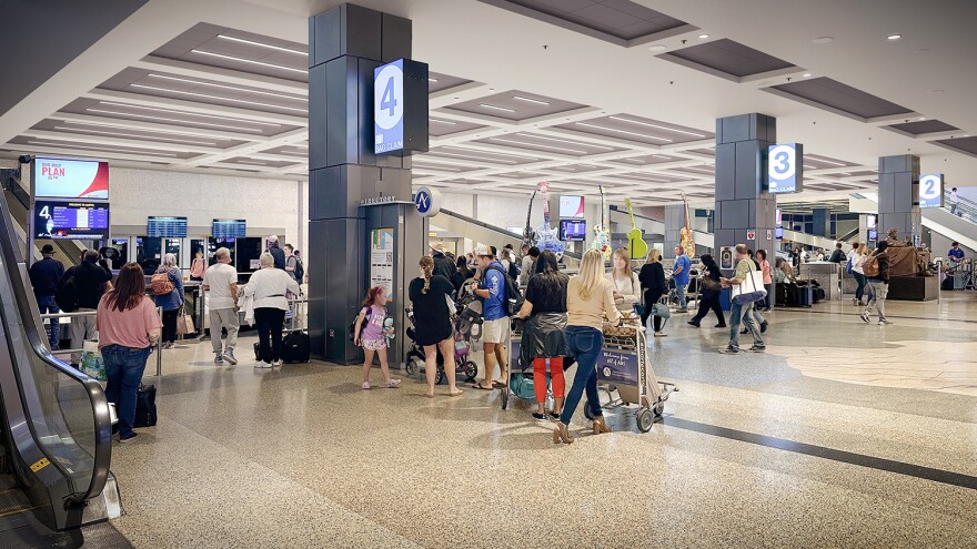 An illustration of the baggage claim area at ABIA after the overhead atrium is covered to increase second-floor space by 12,000 square feet.