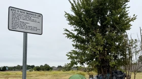 People were camping on a state-owned patch of land next to Food and Shelter in Norman on Oct. 3, 2026.