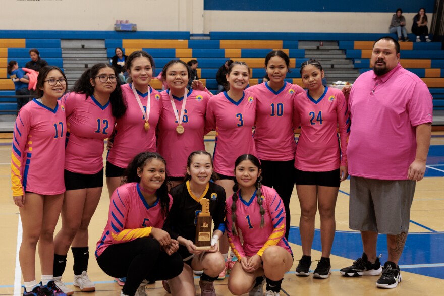 The varsity team from Barrow poses with their trophy after a first-place finish in the Slamtastic Tournament on Oct. 21, 2023.