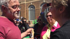 Gubernatorial candidates Howie Hawkins, left, and Cynthia Nixon meet at a climate rally in Albany Monday KAREN DEWITT / WRVO NEWS