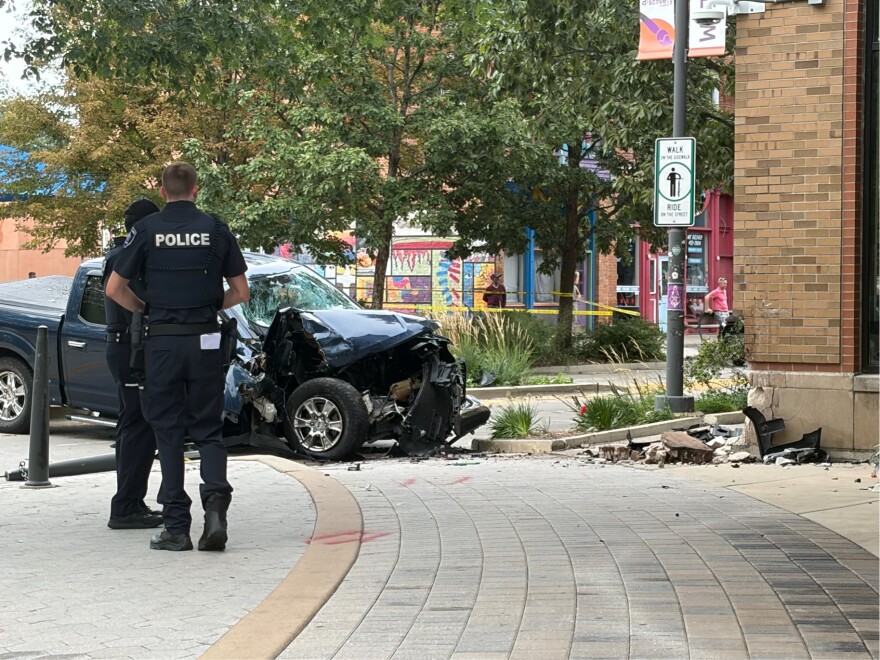 Normal Police at the scene of a crash Friday afternoon in Uptown Normal, just outside the Children's Discovery Museum.