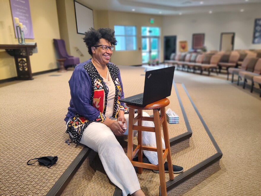 Reverend Crystal Muldrow demonstrates her Zoom setup for Sunday sermons at Unity of Fort Myers on Monday, Jan 4, 2020. Sermons take place virtually every Sunday and are streamed on social media. 