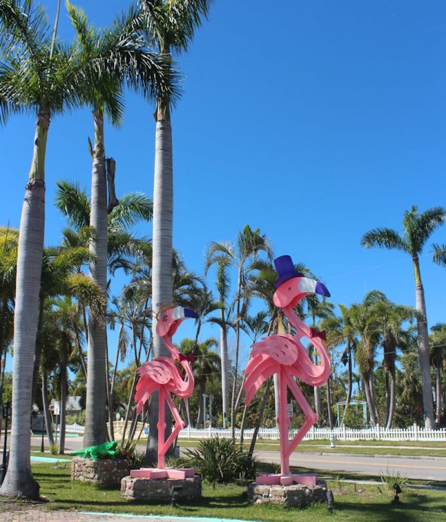 Two of the Marietta Museum of Art & Whimsy's pink flamingoes.