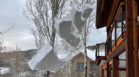 Heavy slabs of snow slide off a roof in the Sunpeak subdivision in Summit County on Thursday, January 6, 2022