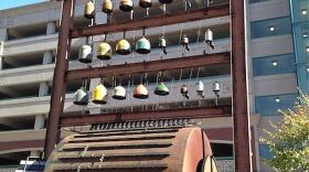 The "JunkYard Music Box" was made out of a rusty water tank, old car parts, leftover granite, two I-beams, and an antique meat grinder.