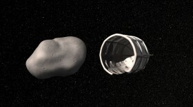 This computer-generated image provided by Planetary Resources, a group of high-tech tycoons that wants to mine nearby asteroids, shows a conceptual rendering of a spacecraft preparing to capture a water-rich, near-Earth asteroid.