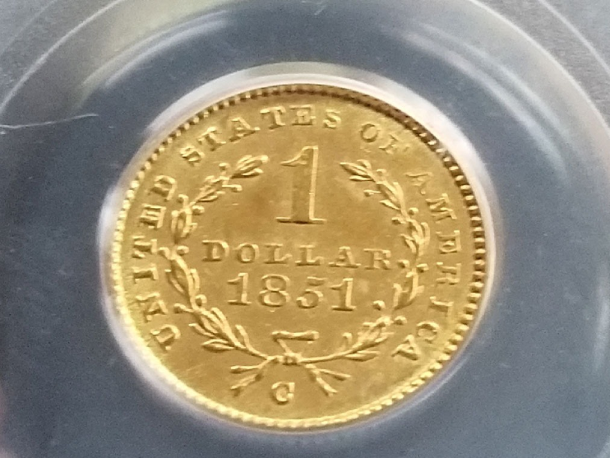 In 1849, the Charlotte mint produced a dollar coin that was just a bit different than most of its run – one with an open wreath pattern.