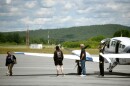 Passengers disembark off a flight from Boston at the Lebanon Municipal Airport on June 16, 2026 in West Lebanon, New Hampshire. (Valley News photo)