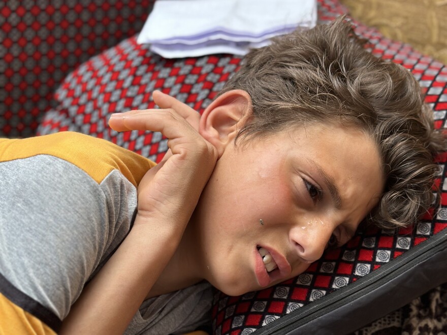 Nimer Saddy al-Nimer, 12, was shot five times by Israel's military on April 1 while gathering food from aid dropped by parachute that landed in Beit Hanoun, in northern Gaza. Israeli soldiers took the boy into Israel for surgery, and, according to Nimer, placed him in a prison for four days while he recovered. He is now in a refugee camp in Rafah, in the southern Gaza Strip.