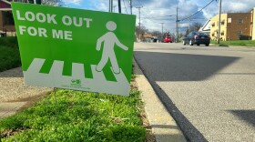 A crosswalk sign in East Westwood, Cincinnati.