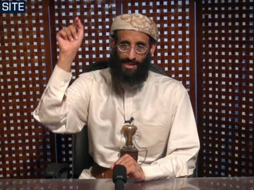 In this image taken from video and released by SITE Intelligence Group, Anwar al-Awlaki speaks in a video message posted on radical websites in November, 2010.