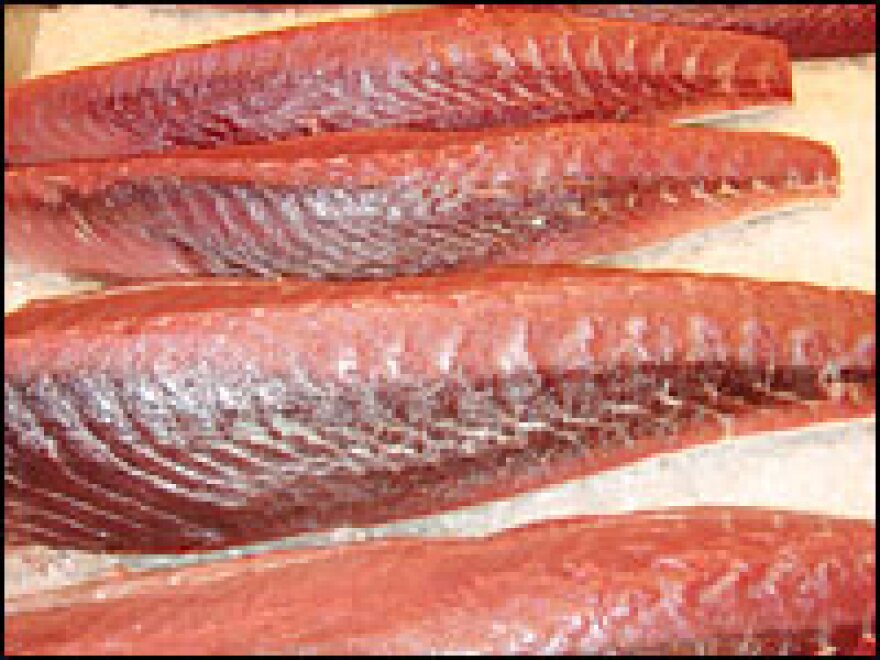 Fresh seafood is a must for making crudo, sushi and other raw fish dishes. Here, yellow fin tuna lies on ice at the Fulton Fish Market in the Bronx.