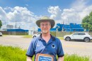 Dylan Keenan, a former lead air pollution permit engineer with the New York State Department of Environmental Conservation, holds up an award outside the Goodyear Tire and Rubber factory on 56th Street in Niagara Falls, NY on June 29, 2026.