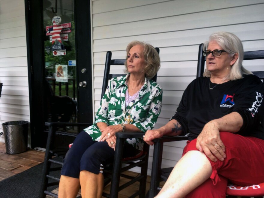Sisters Judi Casalino (left) and Janie Caudill (right) sit at the hair salon Caudill owns. Both sisters have suffered from flooding: Janie lost her salon in the 2010 flood, and Judi's nearby home has flooded multiple times.