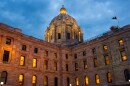 Lights stay on inside the Minnesota State Capitol Building as the sun sets during a special legislative session Monday, June 9, 2025.