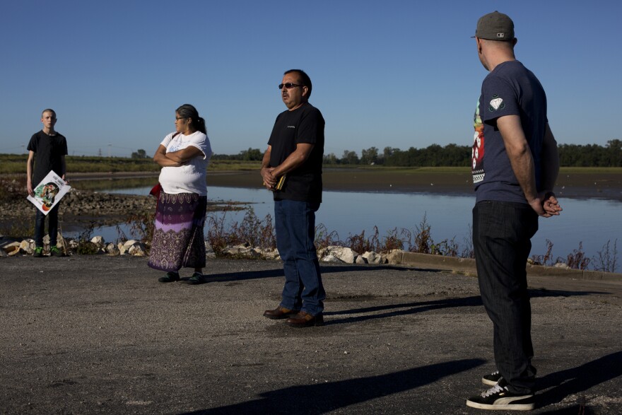 Philip McDowell, originally from the Standing Rock Sioux reservation, speaks before the start of the ceremony.