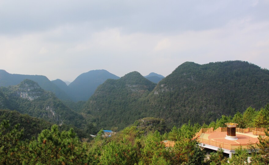 Guizhou Province's karst mountains surround the telescope and block out interference that would block distant signals.