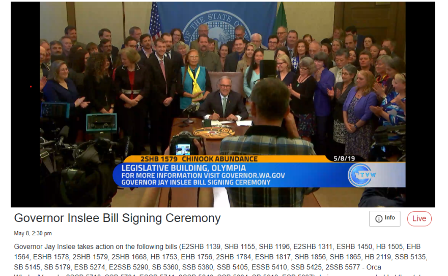 A screenshot from the signing ceremony Wednesday, when Gov. Jay Inslee signed five bills based on recommendations from his orca recovery task force.