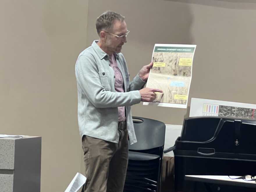 Tim Prinsen points to a map to show where he is seeking an easement from the Minnesota Department of Natural Resources inside the Cuyuna Country State Recreation Area at a CCSRA Community Advisory Committee meeting April 16, 2026, at Crosby City Hall.