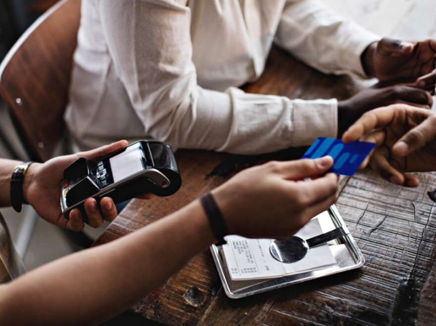 Reaching for the check like...