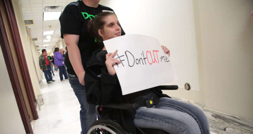 Jordan Martin and other developmentally disabled people, along with advocates and caregivers, urged lawmakers to prevent budget cuts at the state Capitol in Oklahoma City Thursday.