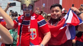 Norway fans celebrate outside Dallas Stadium.