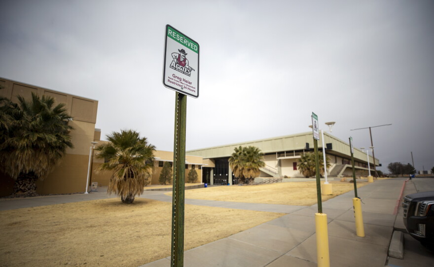 The parking spot for Greg Heiar, former New Mexico State University men's basketball coach, shows a reserved sign outside the Pan American Center, Wednesday, Feb. 15, 2023, in Las Cruces, N.M.