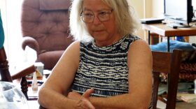 Marion County Record reporter Phyllis Zorn answers questions during a July 2024 interview in her home in Marion. Zorn says police, who accused her of committing identity theft by looking up a public record, used her as a pawn to target the newspaper.