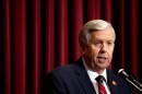 Gov. Mike Parson addresses the House chamber Wednesday at the state Capitol in Jefferson City.